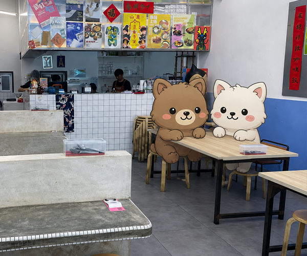 chou che che and jo pi pi seated in papasan canteen